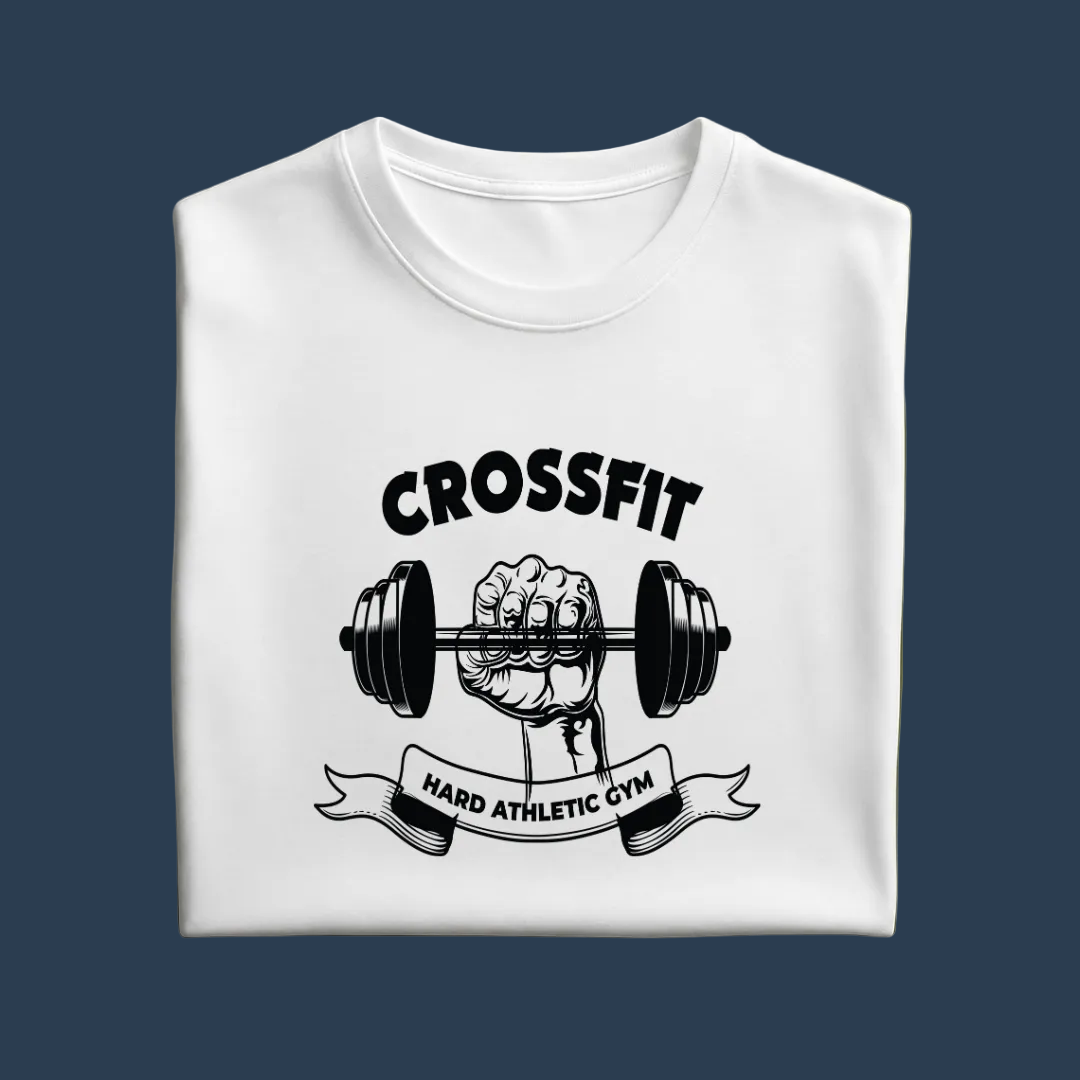 A folded white crewneck t-shirt with a black graphic print of a hand gripping a barbell under the word 'CROSSFIT' and above a banner reading 'HARD ATHLETIC GYM', displayed on a solid olive green background.